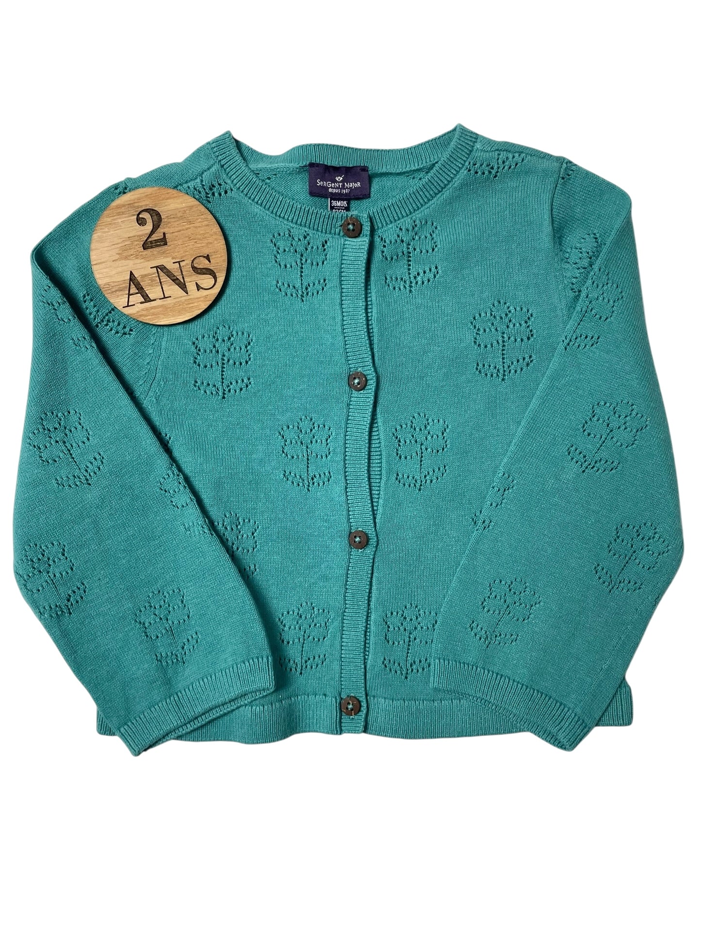 Gilet bleu-vert, Sergent Major