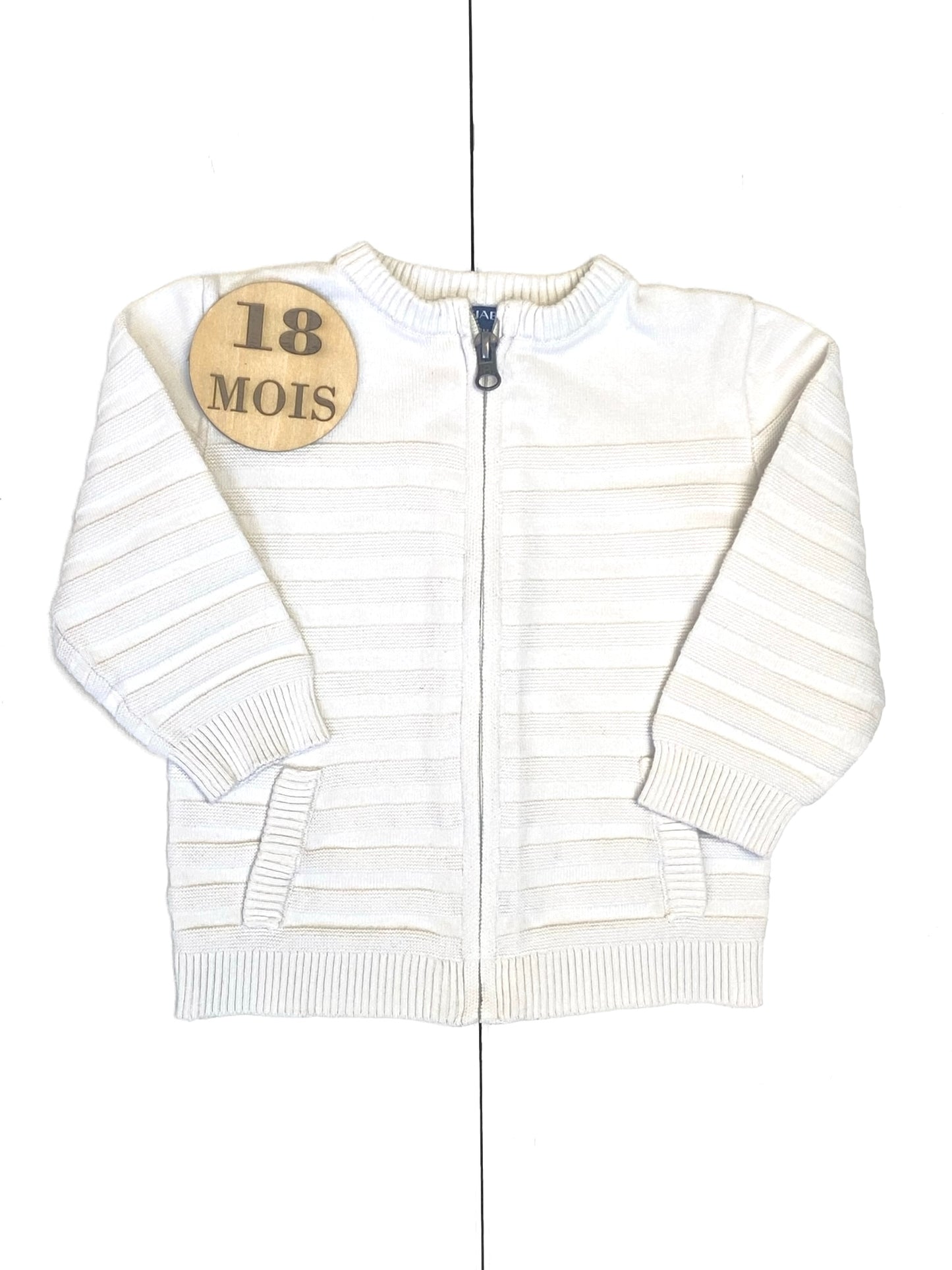 Gilet blanc, Kiabi