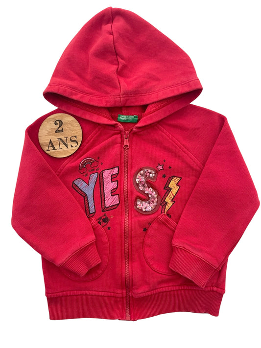 Gilet rouge, Benetton