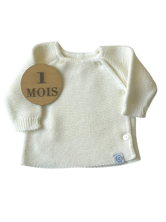 Brassière en mailles écrue, La manufacture de la layette