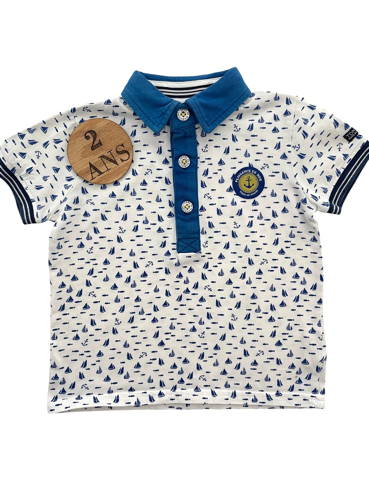 Polo bleu et blanc, Terre de Marins