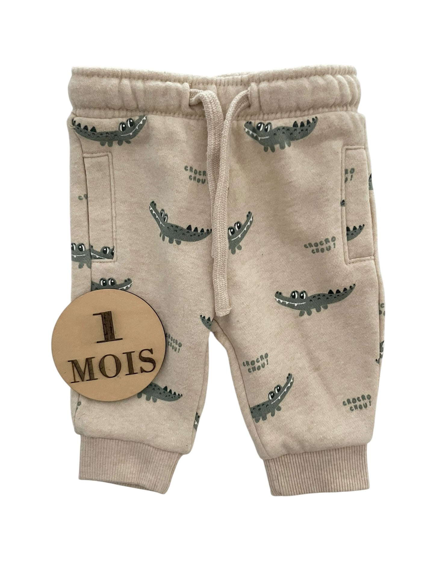 Jogging crème, crocodiles, Kiabi