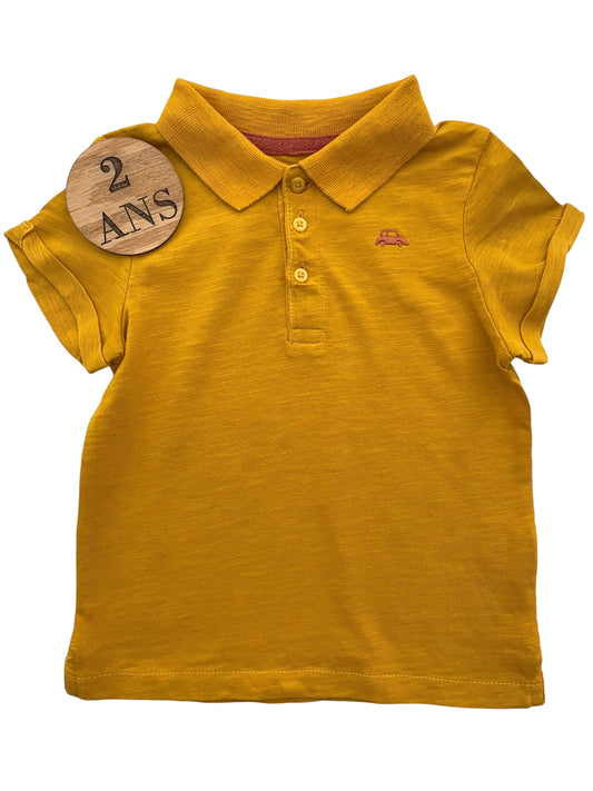 Polo moutarde, Kiabi