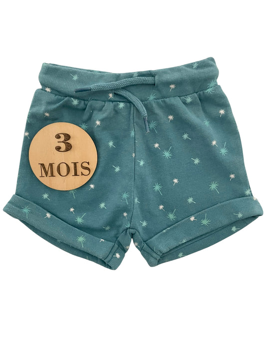 Short molleton bleu, palmiers, Boîte à malices